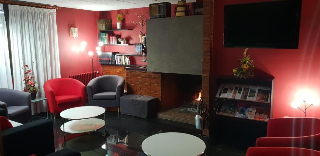Posezení v ubytování Hotel Les 7 Claus