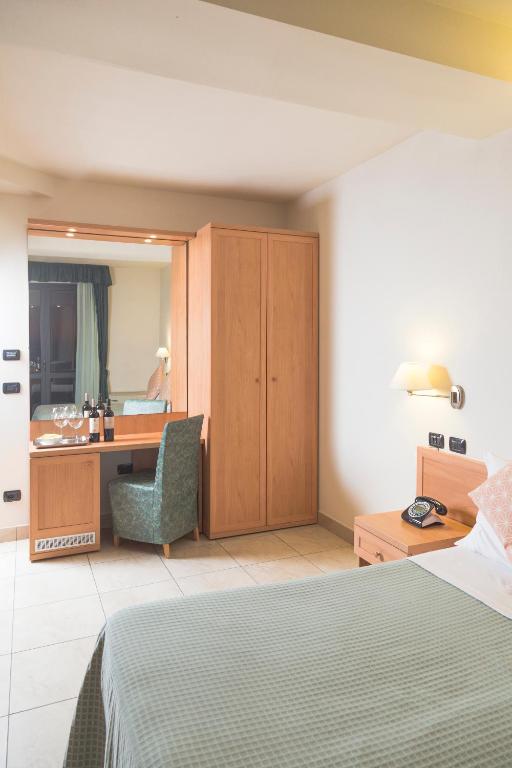 Postel nebo postele na pokoji v ubytování Hotel Bixio