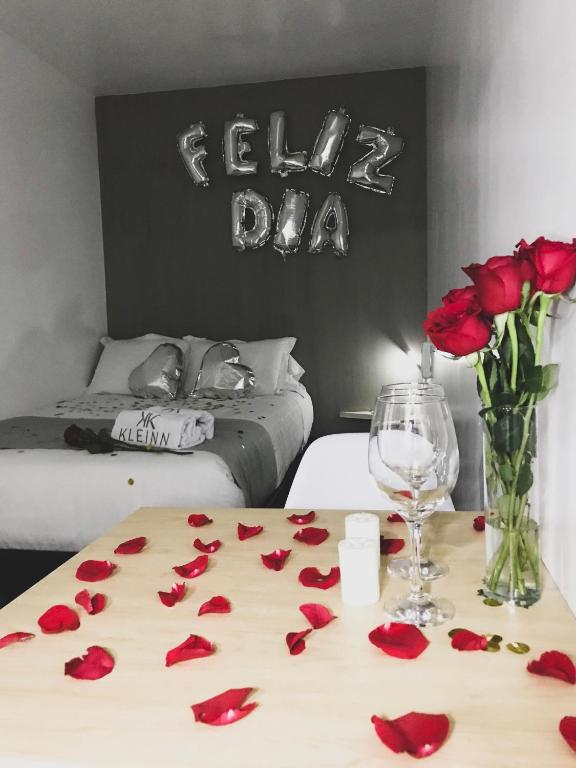 Postel nebo postele na pokoji v ubytování KLEINN HOTEL BOGOTÁ