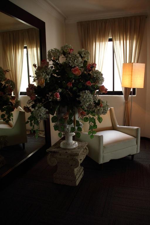 Postel nebo postele na pokoji v ubytování Hotel Clara Luna