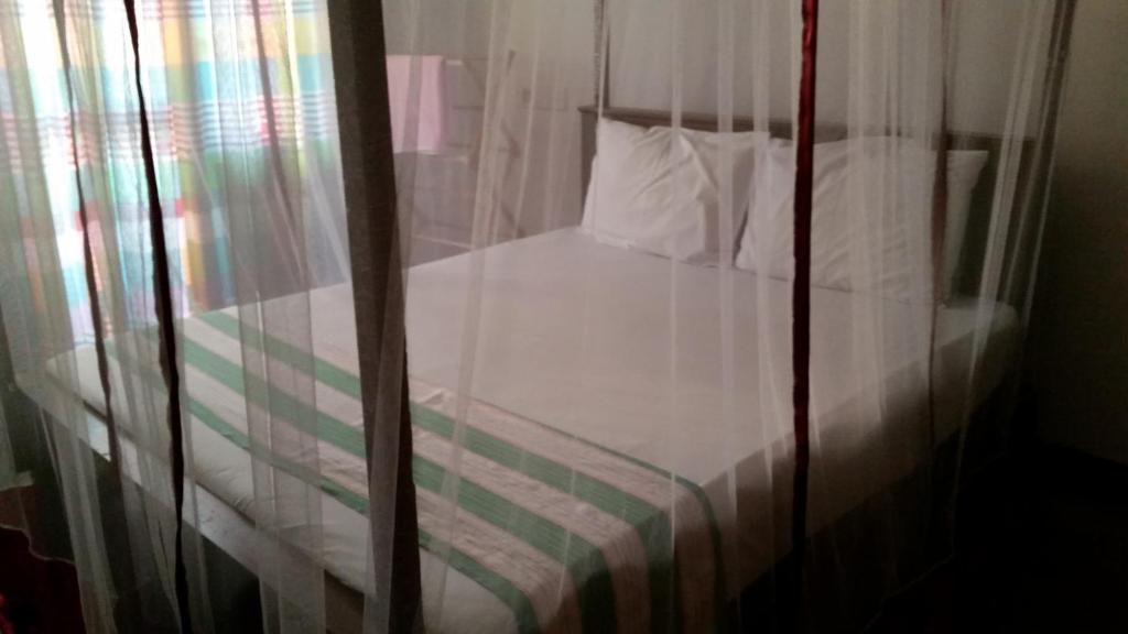 Postel nebo postele na pokoji v ubytování Chelli Homestay