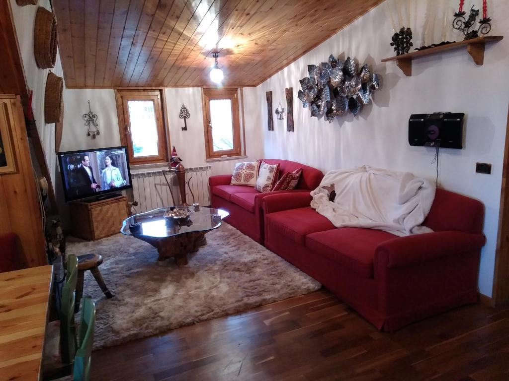 Telewizja i/lub zestaw kina domowego w obiekcie Condominio Esagono