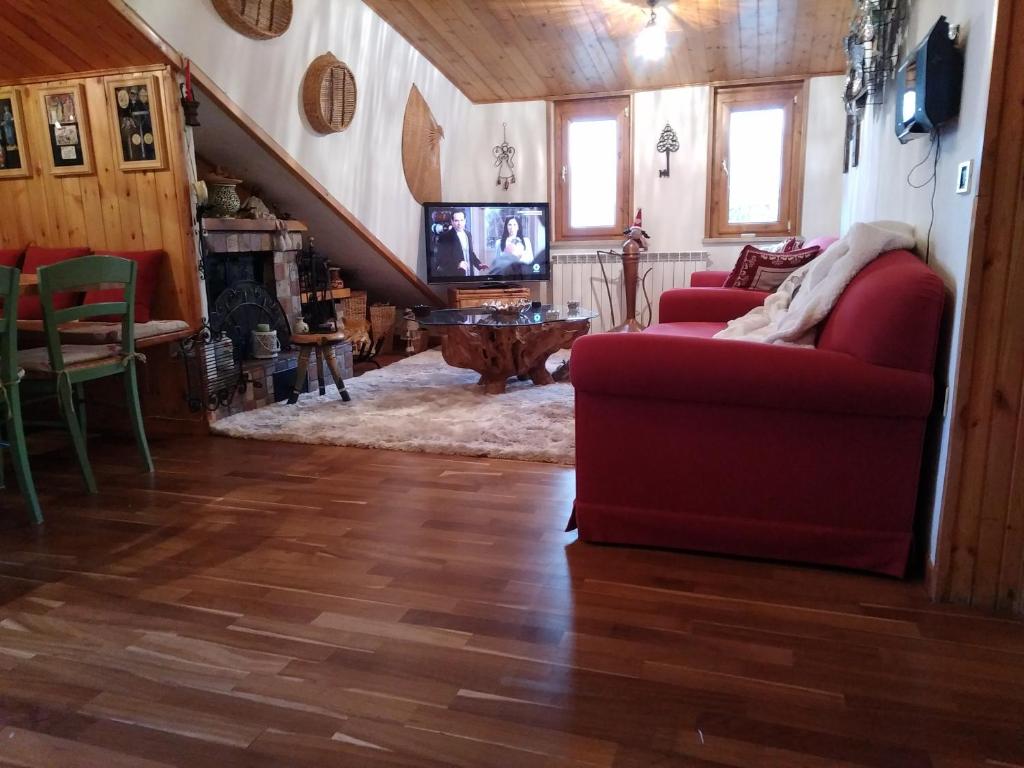 Telewizja i/lub zestaw kina domowego w obiekcie Condominio Esagono