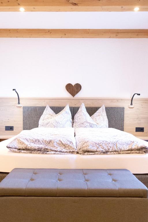 Postel nebo postele na pokoji v ubytování Haus Steinbock
