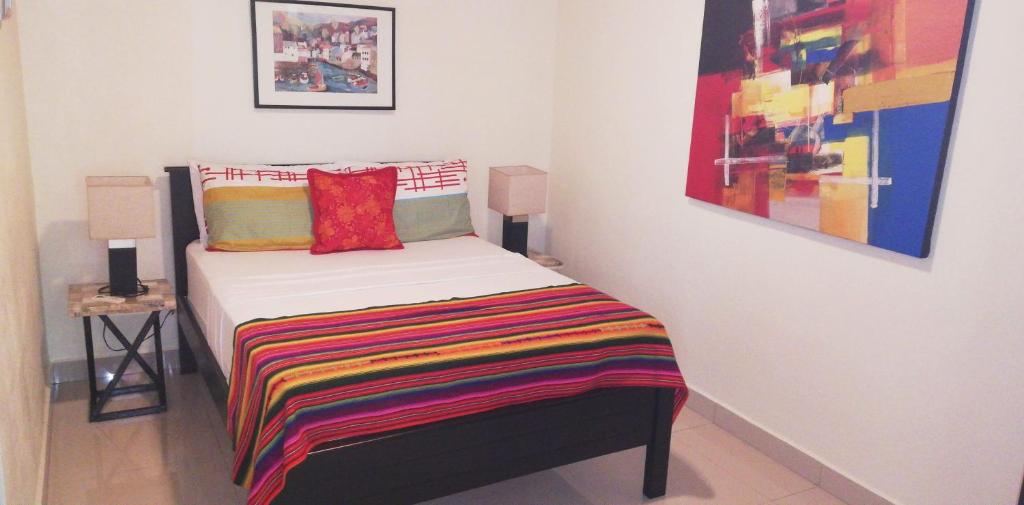 Postel nebo postele na pokoji v ubytování Coyaba Tropical Elegant Adult Guesthouse