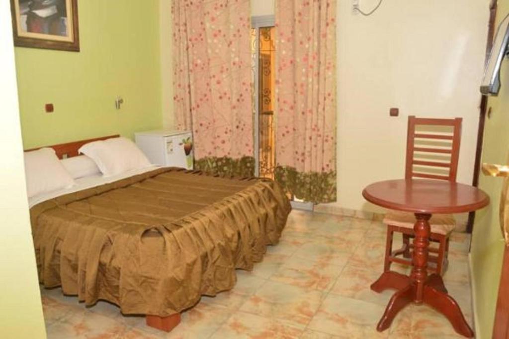Postel nebo postele na pokoji v ubytování Hotel - Y