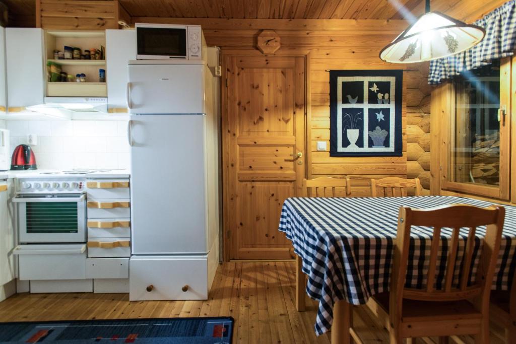 Kuchyň nebo kuchyňský kout v ubytování Jänkäkolo Holiday Home
