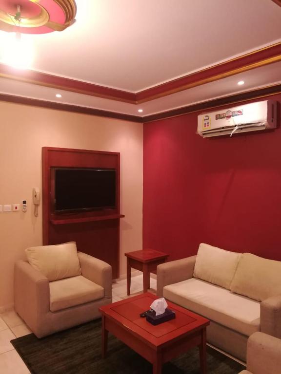 TV a/nebo společenská místnost v ubytování Leen Serviced Apartments