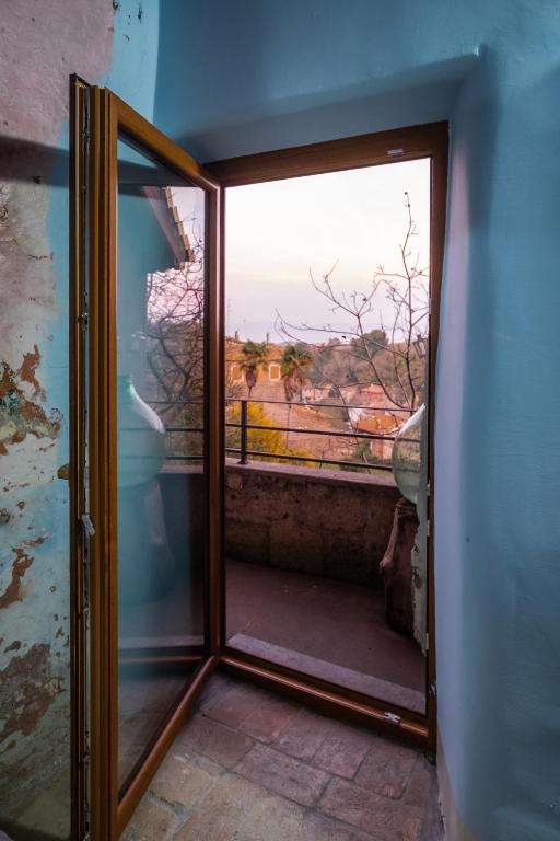 Balkón nebo terasa v ubytování Giamevi House