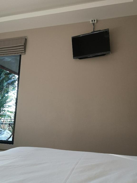 TV a/nebo společenská místnost v ubytování Sleep Soundly By The Sea