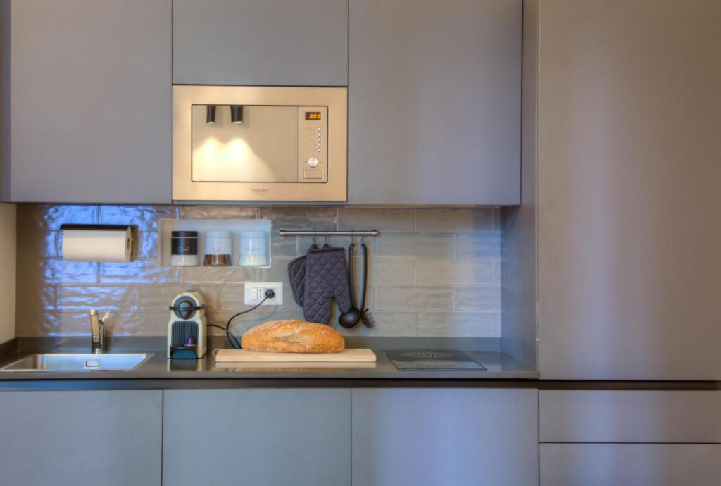 Kuchyňa alebo kuchynka v ubytovaní App Beccaria Apartments in Rome