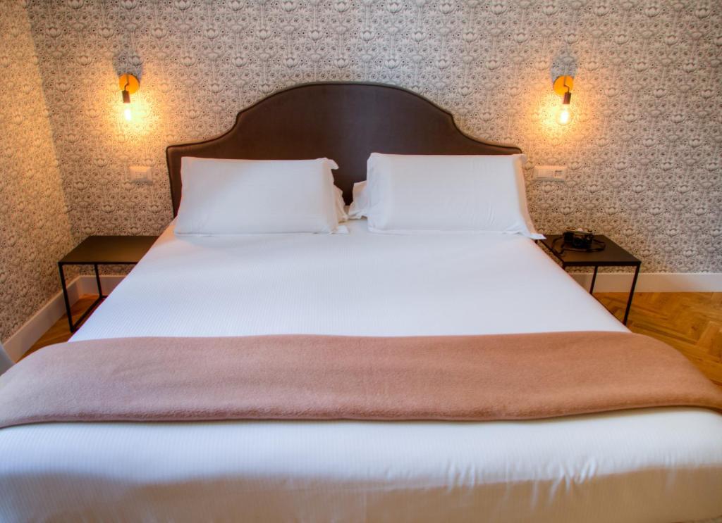 Posteľ alebo postele v izbe v ubytovaní App Beccaria Apartments in Rome