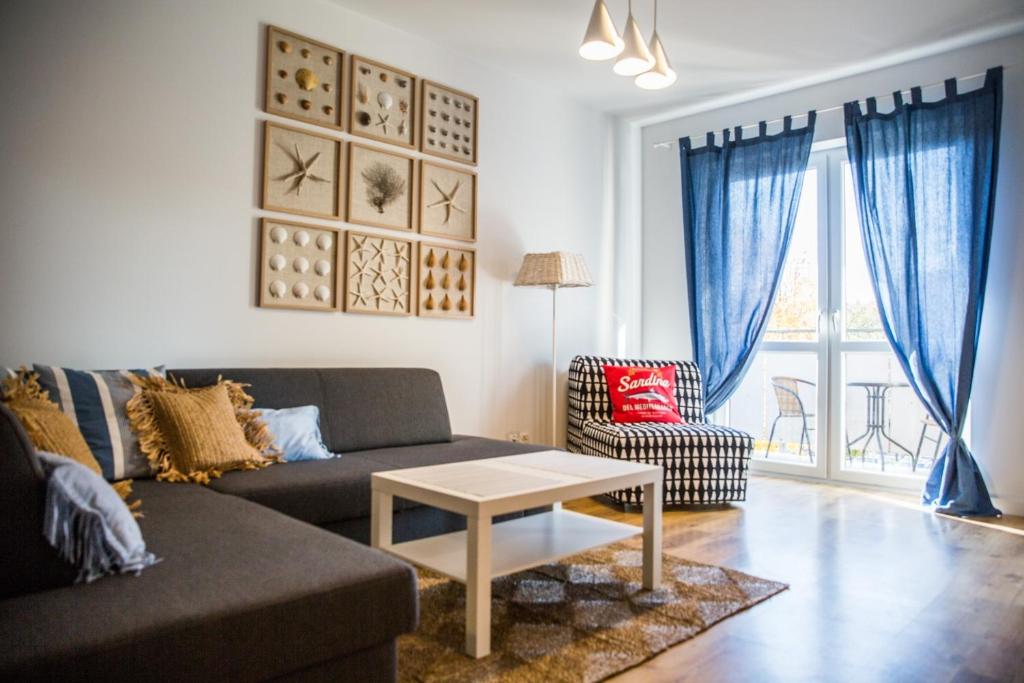 Posezení v ubytování APARTAMENT SEASHELL KOŁOBRZEG BOCIANIE GNIAZDO