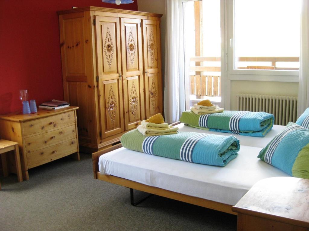 Postel nebo postele na pokoji v ubytování Hotel Bellavista Ftan
