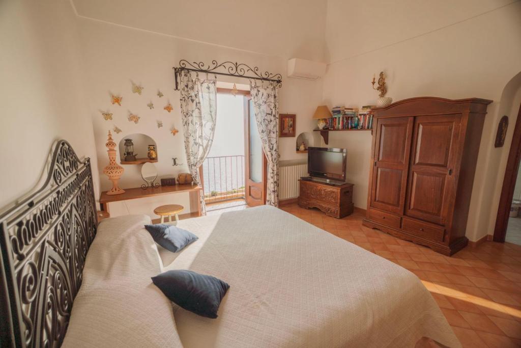 Posteľ alebo postele v izbe v ubytovaní La dimora degli Dei
