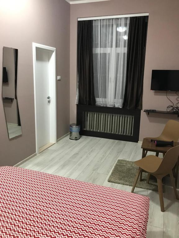 TV a/nebo společenská místnost v ubytování Hostel Fine