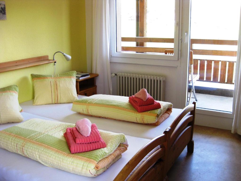 Postel nebo postele na pokoji v ubytování Hotel Bellavista Ftan