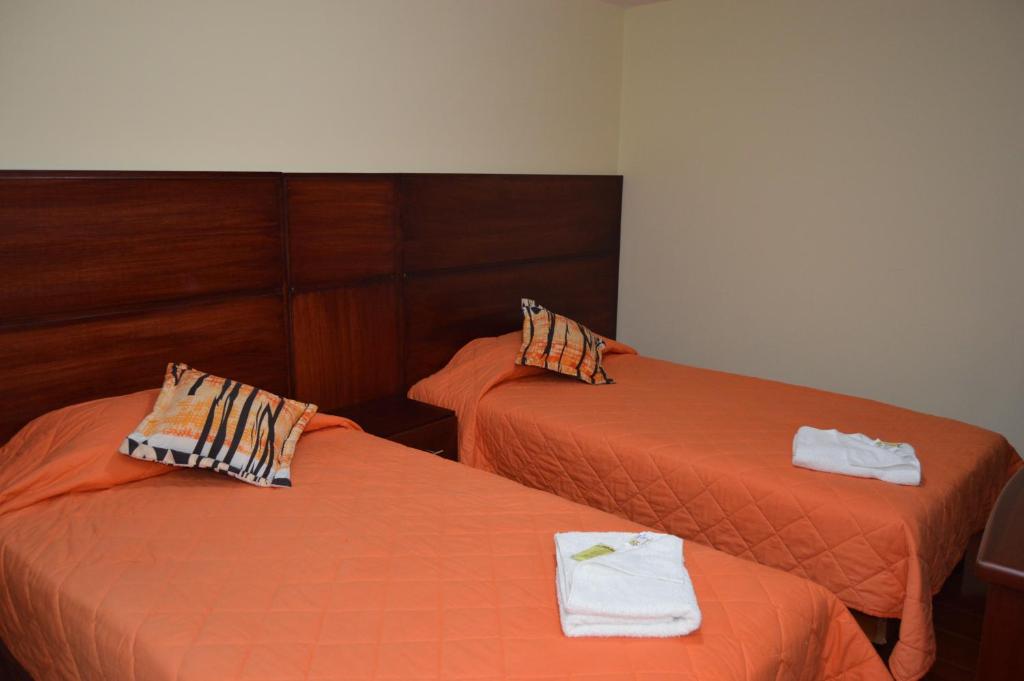 Postel nebo postele na pokoji v ubytování Balcones del Río Hotel