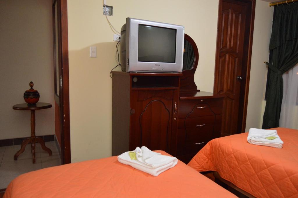 Postel nebo postele na pokoji v ubytování Balcones del Río Hotel