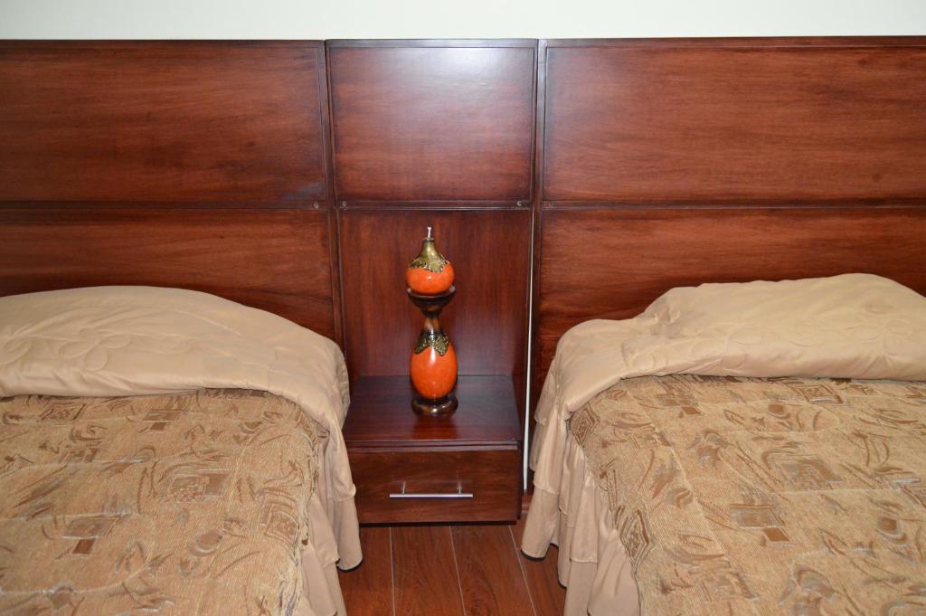 Postel nebo postele na pokoji v ubytování Balcones del Río Hotel