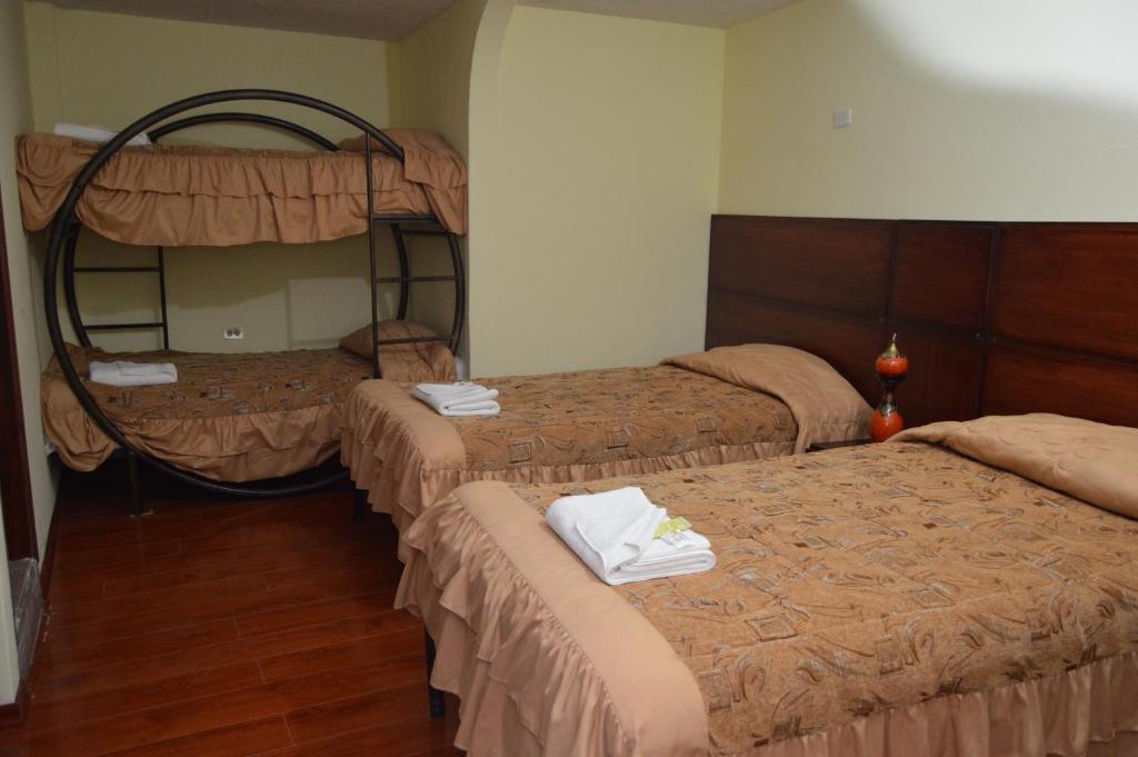 Postel nebo postele na pokoji v ubytování Balcones del Río Hotel
