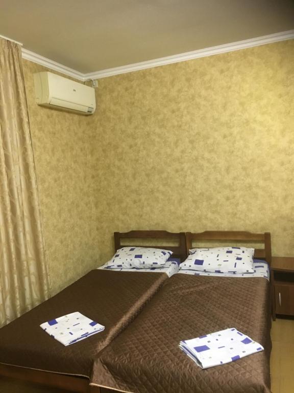 Llit o llits en una habitació de Guest House Antonina