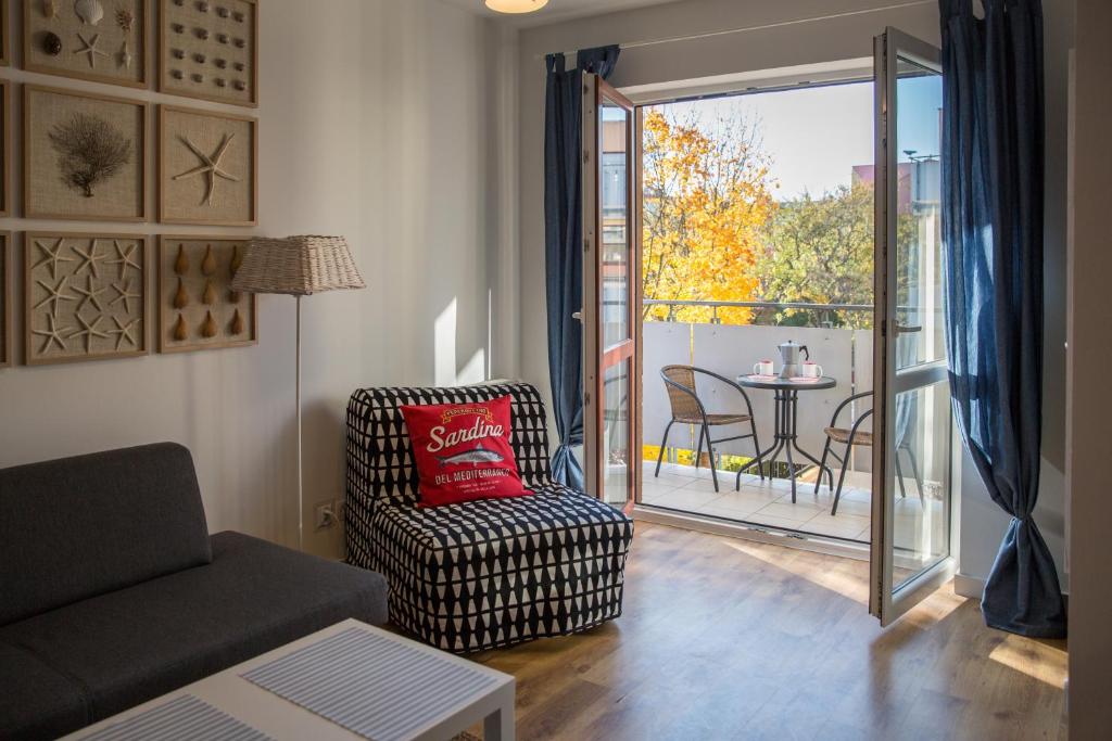 Posezení v ubytování APARTAMENT SEASHELL KOŁOBRZEG BOCIANIE GNIAZDO