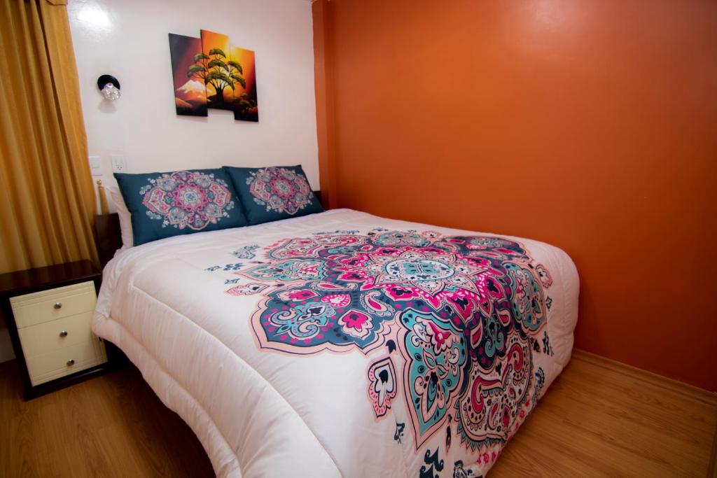 Postel nebo postele na pokoji v ubytování Hostal Alpachaca - New Quito Airport