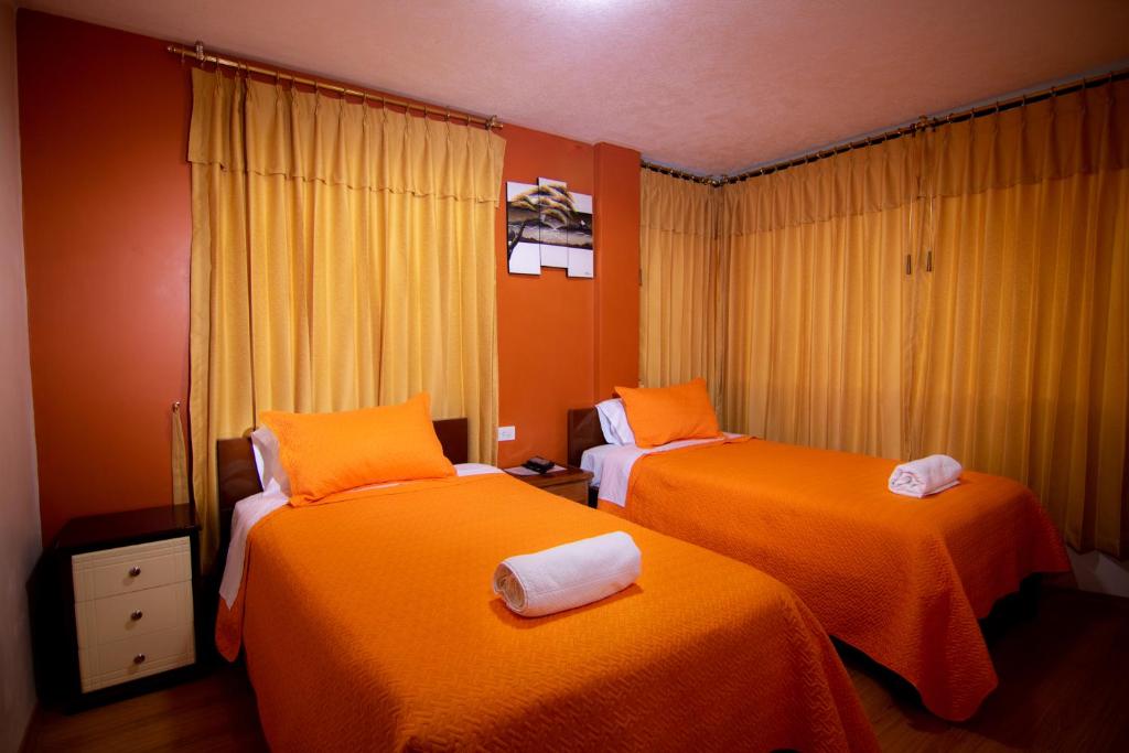 Postel nebo postele na pokoji v ubytování Hostal Alpachaca - New Quito Airport