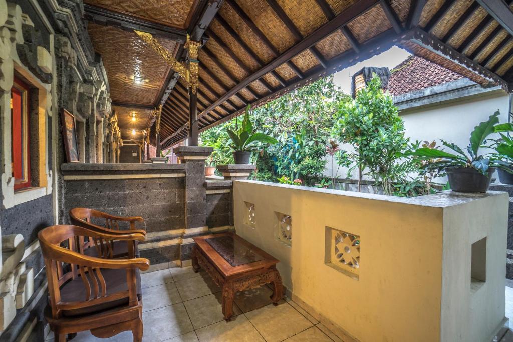 Posezení v ubytování Tegar Guest House Ubud