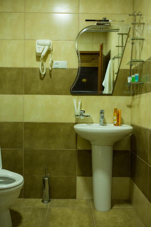Koupelna v ubytování Hotel Dimasi