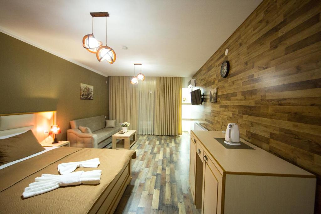 Kuchyň nebo kuchyňský kout v ubytování Hotel Dimasi