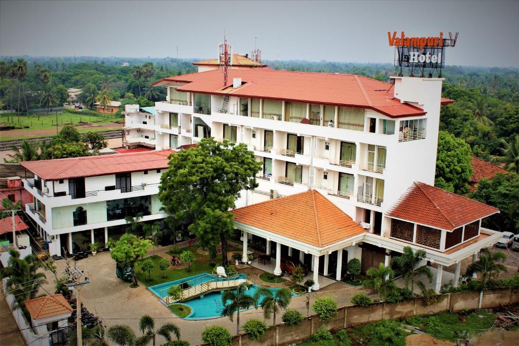 an aerial view of a hotel with a swimming pool at The Valampuri in Jaffna