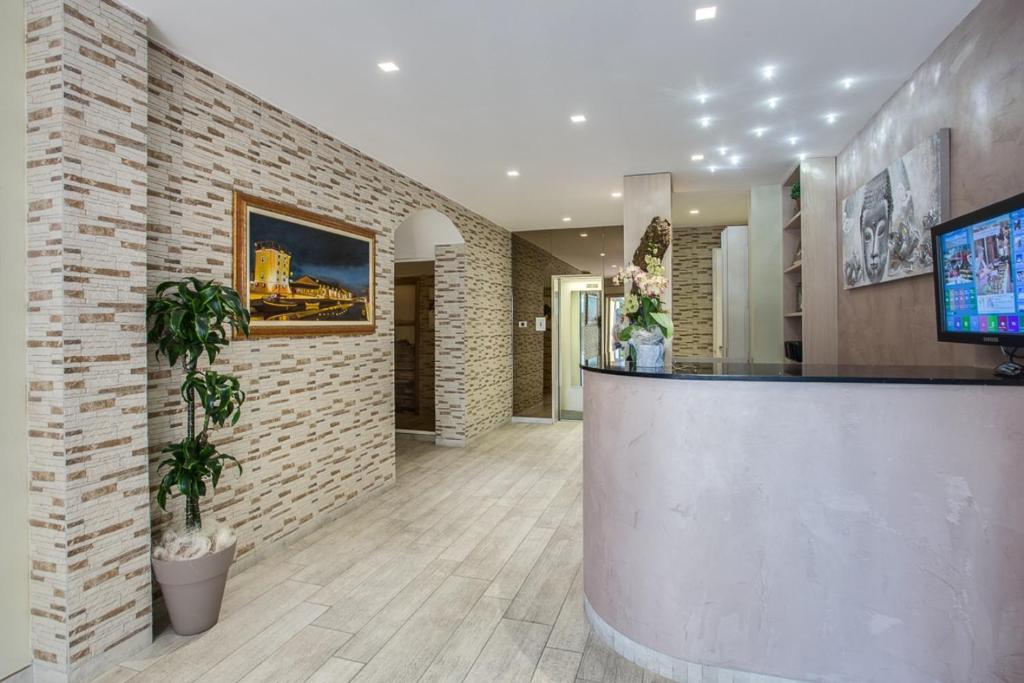 TV a/nebo společenská místnost v ubytování Hotel Riz