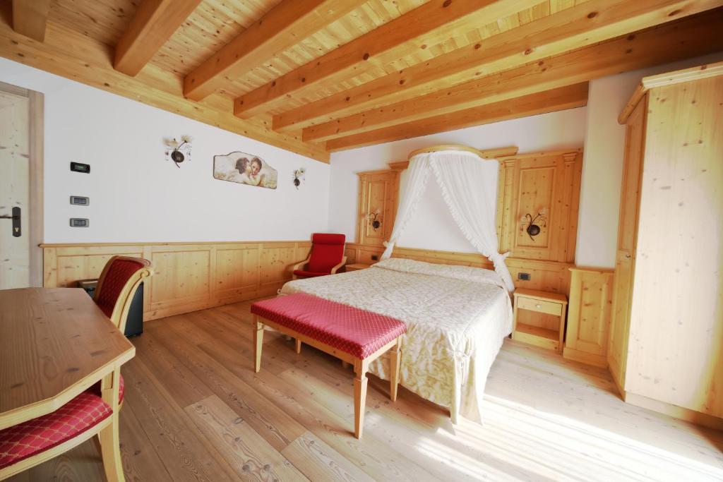 Postel nebo postele na pokoji v ubytování Agriturismo Ai Castioni