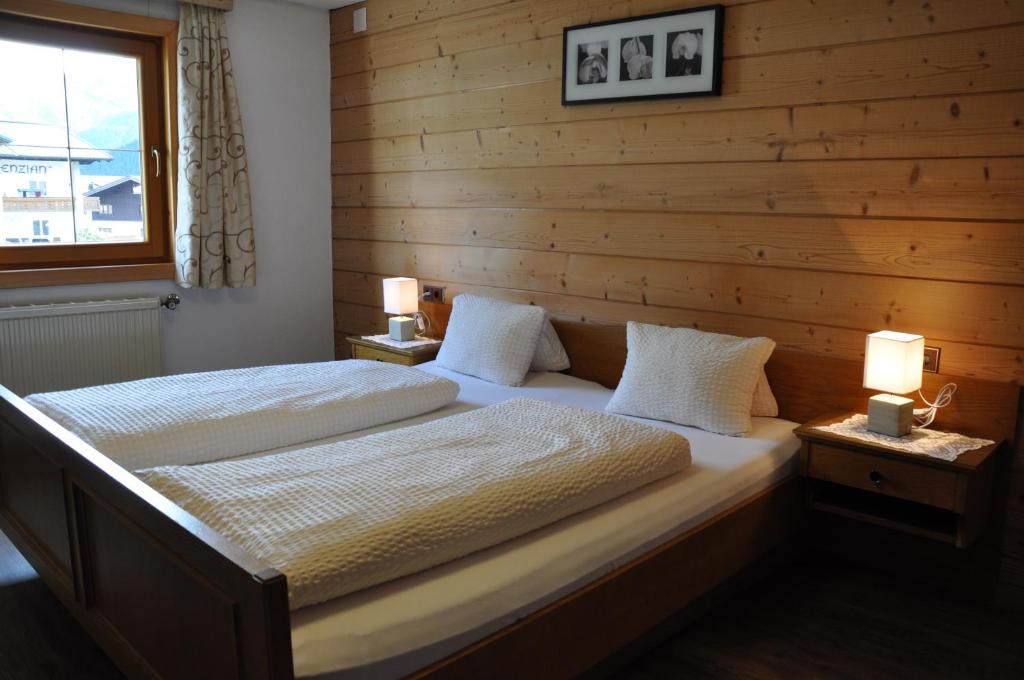 Postel nebo postele na pokoji v ubytování Berghof