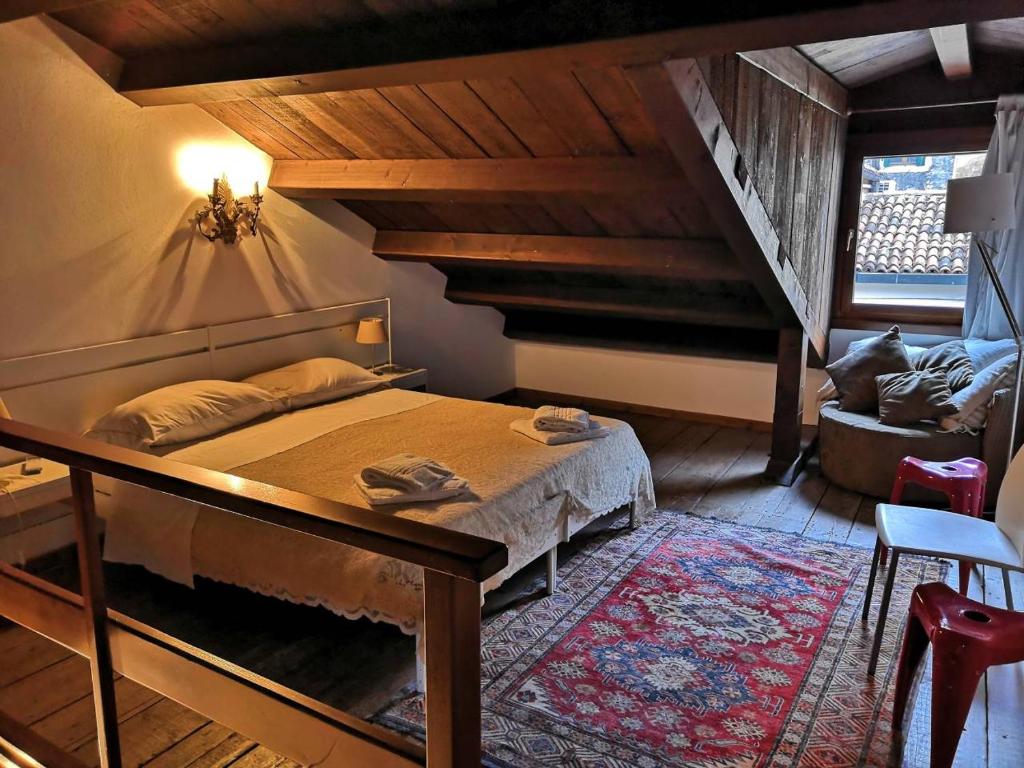 Кровать или кровати в номере CASTELLO FIRST