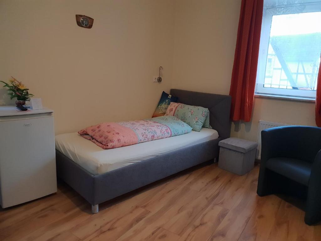 Postel nebo postele na pokoji v ubytování Hotel Alte Post