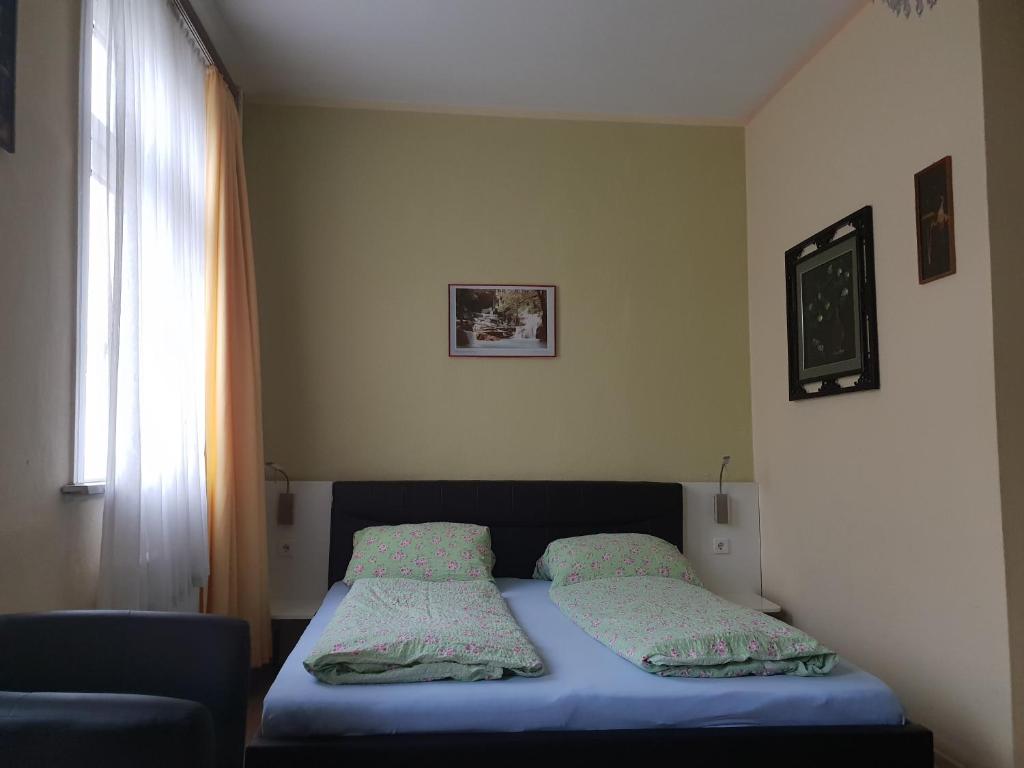 Postel nebo postele na pokoji v ubytování Hotel Alte Post
