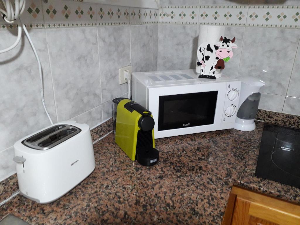A kitchen or kitchenette at Edificio Gavota
