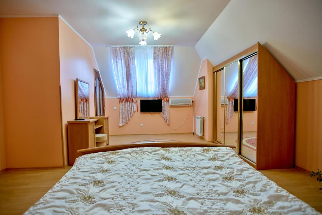 Postel nebo postele na pokoji v ubytování Pansionat Bogema