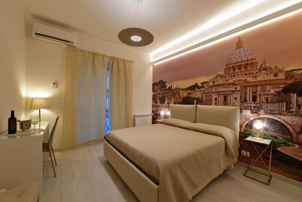 ローマにあるSan Pietro Moonlight Luxury Apartmentのベッドルーム1室(ベッド1台付)