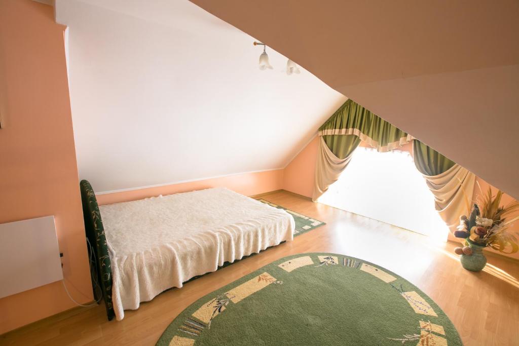 Postel nebo postele na pokoji v ubytování Pansionat Bogema