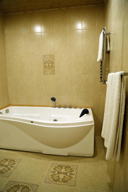 Koupelna v ubytování Tomu's Hotel