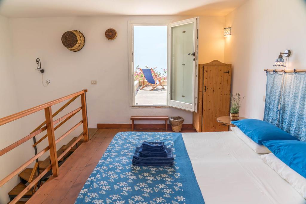 Katil atau katil-katil dalam bilik di Country Houses Monte delle Cristule