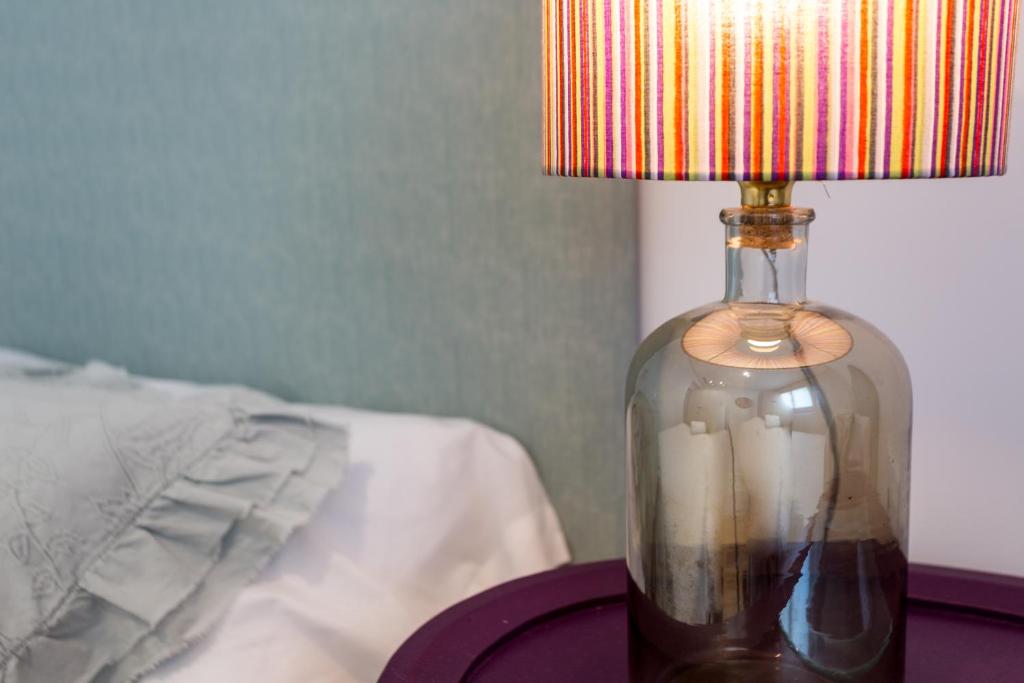 Postel nebo postele na pokoji v ubytování Apartamentos RG Plaza de España