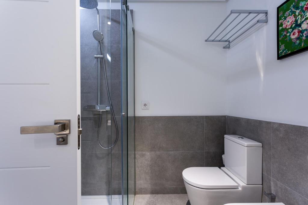 Koupelna v ubytování Apartamentos RG Plaza de España