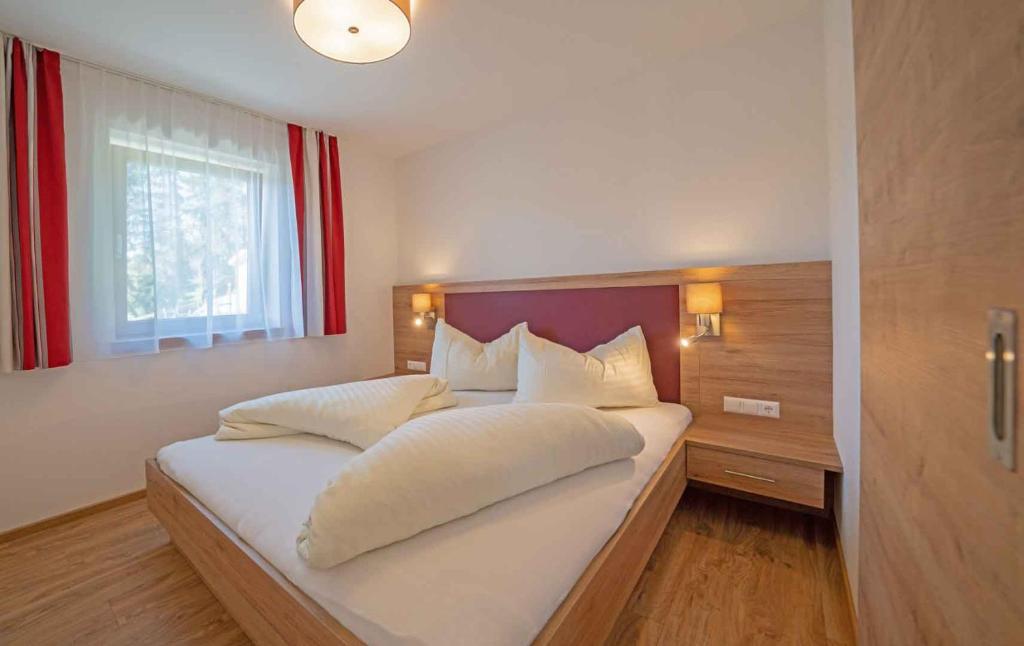 Postel nebo postele na pokoji v ubytování Haus Schluder - Familie Stanitzer