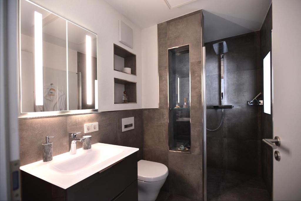 Koupelna v ubytování Aparthotel-Stadtallendorf