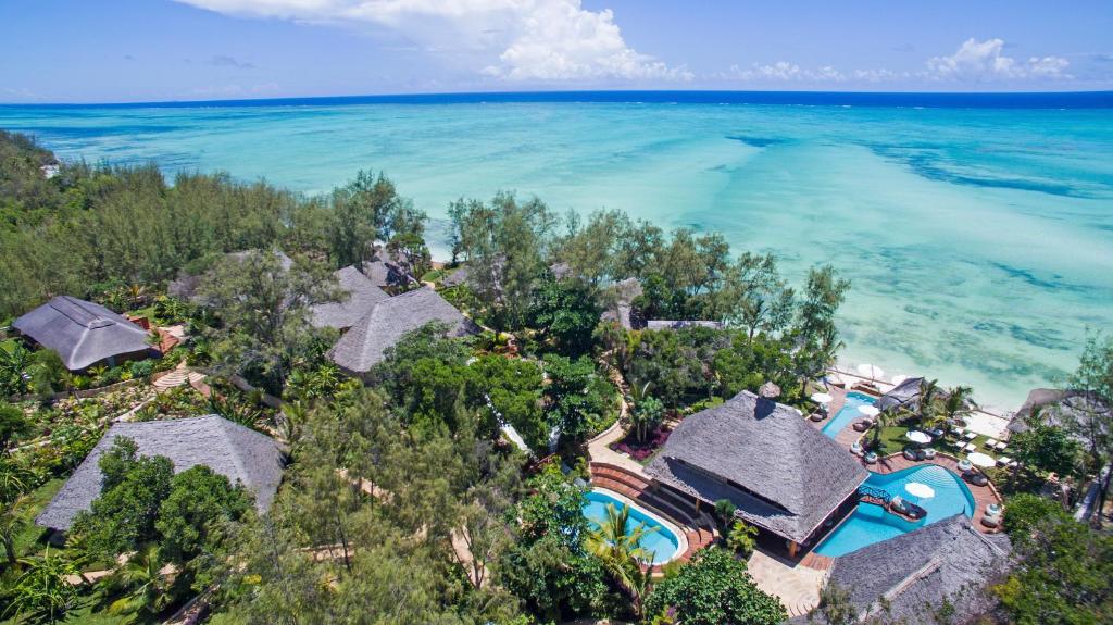 an aerial view of a resort and the ocean at Tulia Zanzibar Unique Beach Resort in Pongwe